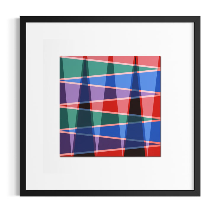 Framed abstract geometric wall art inspired by desert life and mountains featuring overlapping translucent triangles and diagonal lines in red, blue, green, purple, and black on a white mat, presented in a black frame against a light gray background.